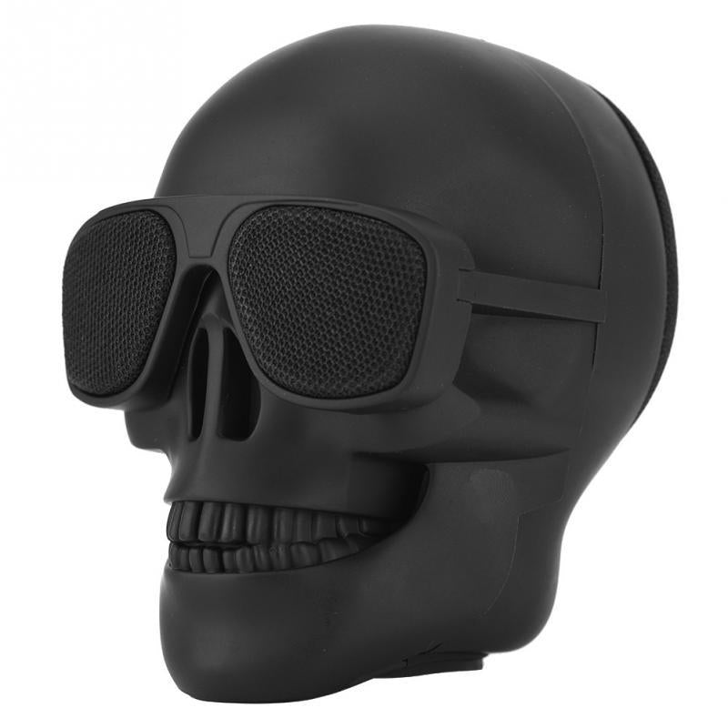 wireless music experience.  wireless audio  statement piece  Skull Head Speaker  portable Bluetooth speaker  on-the-go speaker  music lovers  mini speaker  gothic charm  edgy design  Bluetooth compatibility